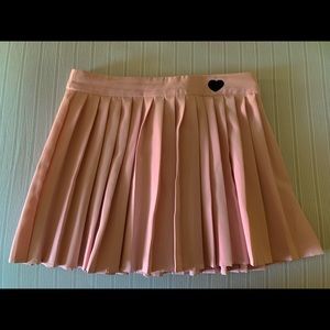 pink pleated skirt